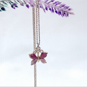 BUTTERFLY charm on silver chain.